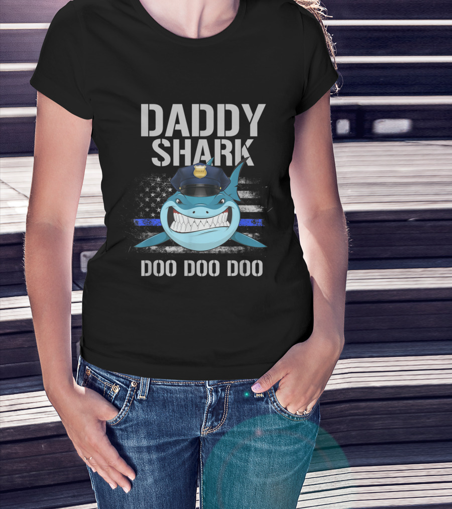 Woman with hands in pockets wearing Daddy Shark Thin Blue Line Flag Police Doo Doo Doo T-Shirt.