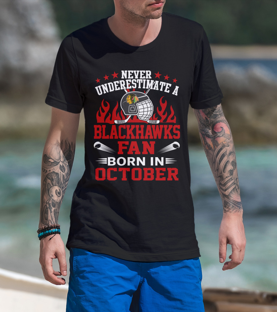 Never Underestimate A Blackhawks Fan Born In October Helmet And Flames Highlighted T-Shirt