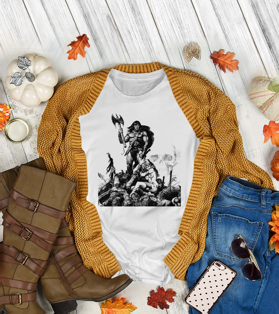 Conan Barbarian Warrior Standing on Battlefield with Axe and Skull in Background T-Shirt