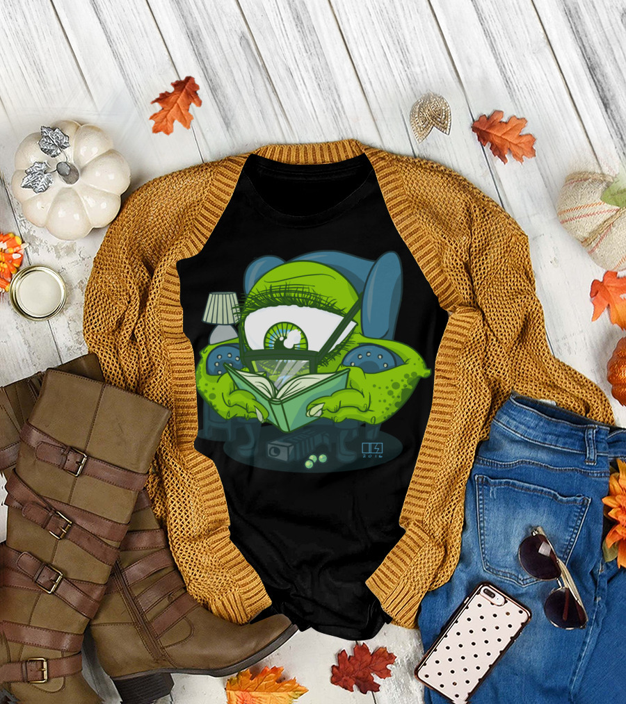Big Green Eyeball Monster Reading a Book in Armchair T-Shirt
