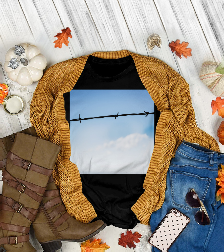 Barbed Wire Against a Blue Sky with Clouds T-Shirt