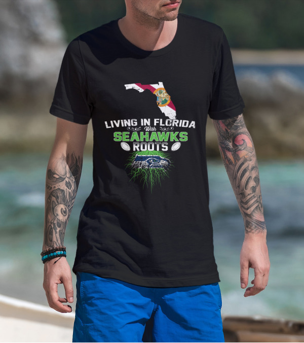 Living In Florida With Seahawks Roots Featuring State Flag And Logo Elements T-Shirt