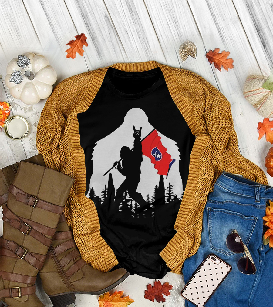 Bigfoot Silhouette with Rock and Roll Pose Holding Tennessee Flag in Forest T-Shirt