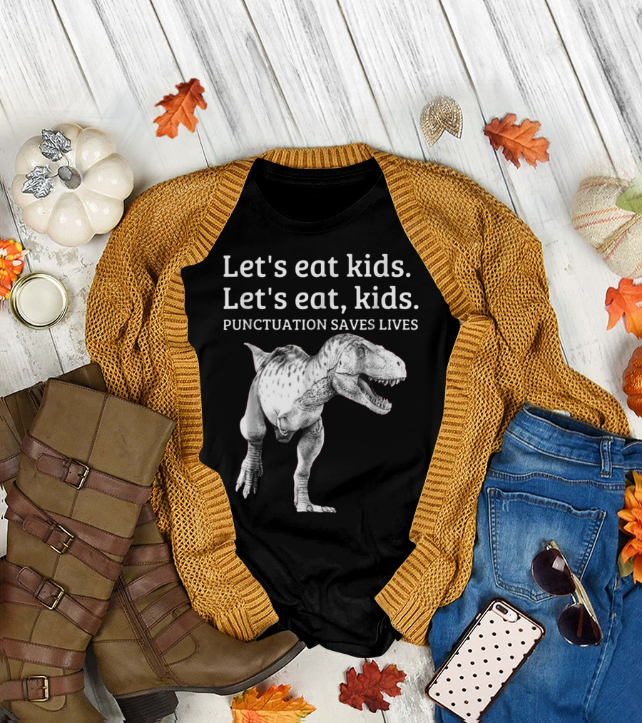 Fall flat lay featuring Let's Eat Kids Let's Eat Kids Punctuation Saves Lives Dinosaur T-Shirt with cardigan.