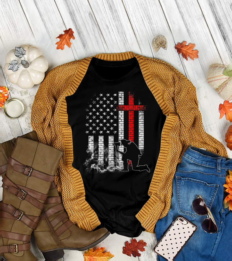 Fireman Kneeling with Axe Over American Flag and Thin Red Line Cross T-Shirt