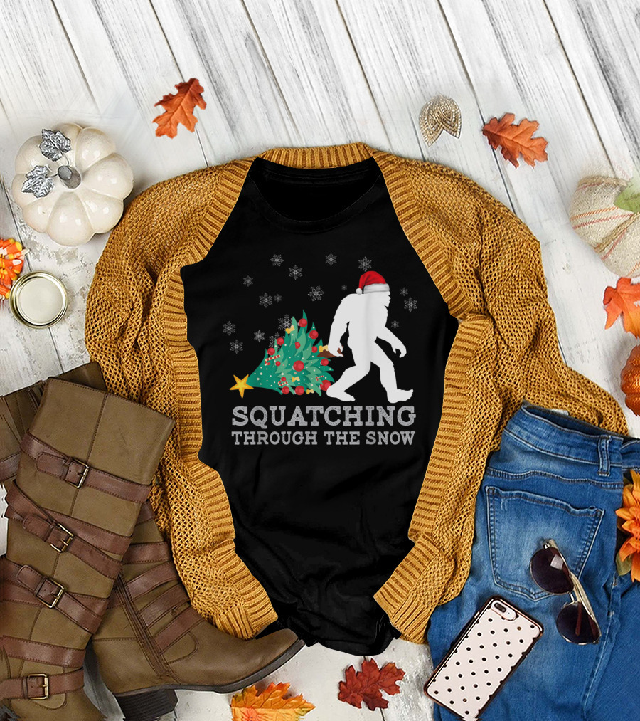 Bigfoot Squatching Through The Snow Santa Hat Christmas Tree Snowflakes T-Shirt