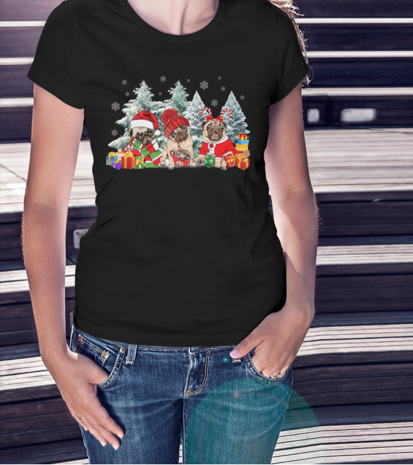 Three Pug Dogs Christmas Reindeer Gifts In Festive Santa Hats And Cozy Winter Scarves With Snowy Trees And Colorful Presents T-Shirt