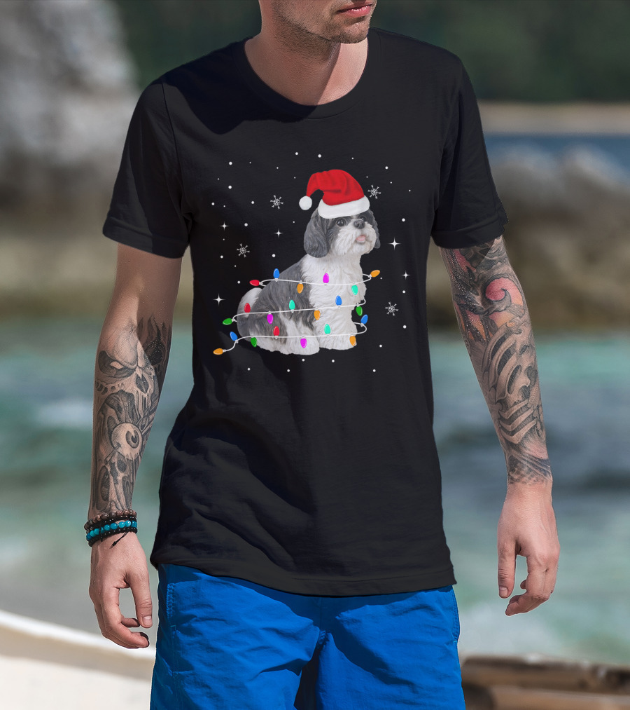 Shih Tzu Wrapped In Christmas Lights With Santa Hat And Snowflakes T-Shirt