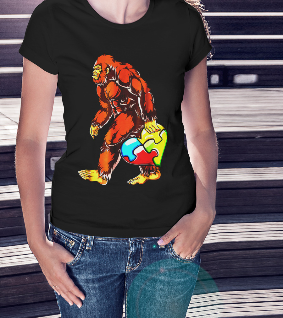 Bigfoot Holding Heart-Shaped Puzzle Piece For Autism Awareness T-Shirt