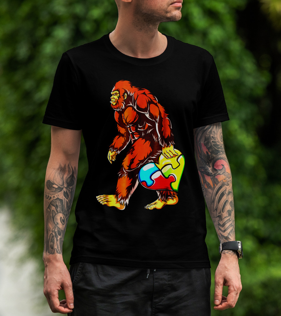 Bigfoot Holding Heart-Shaped Puzzle Piece For Autism Awareness T-Shirt