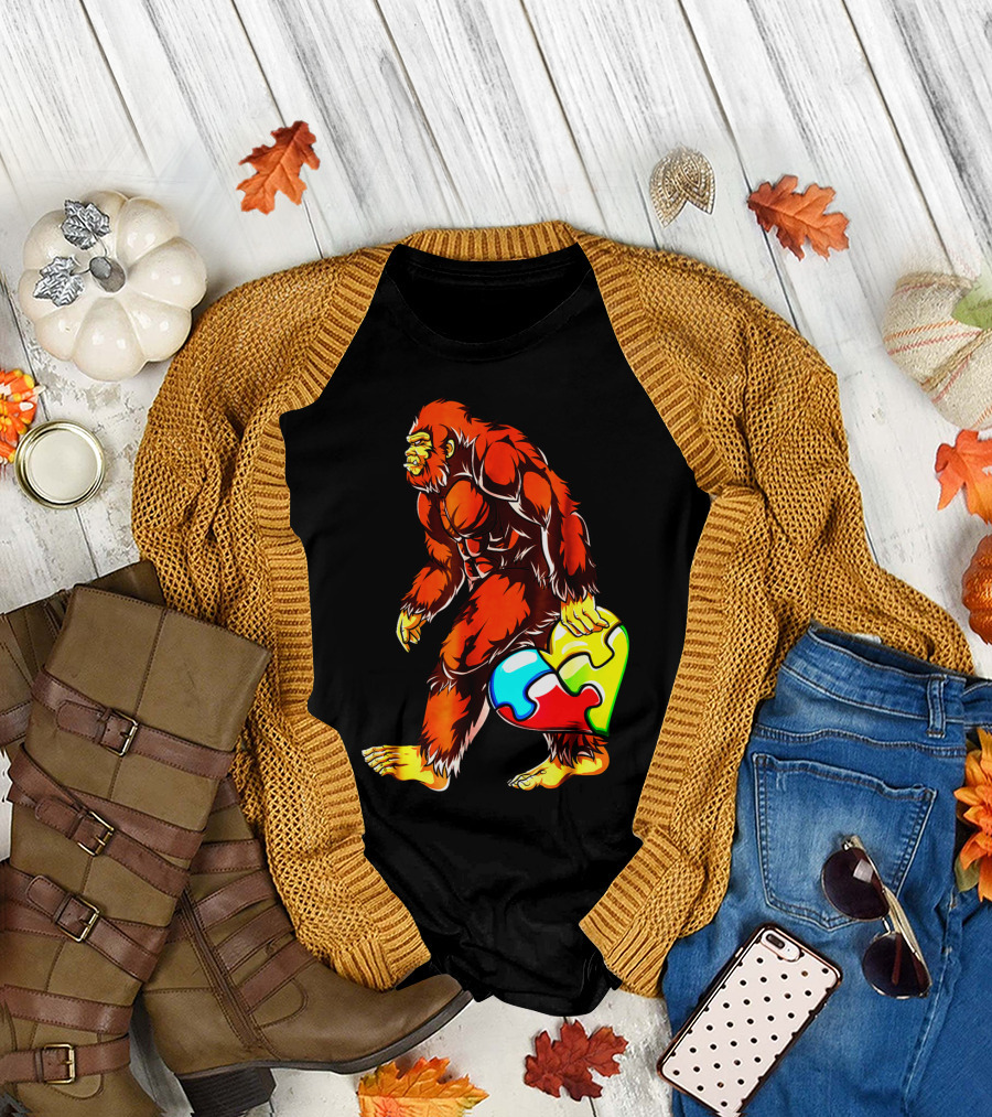 Bigfoot Holding Heart-Shaped Puzzle Piece For Autism Awareness T-Shirt
