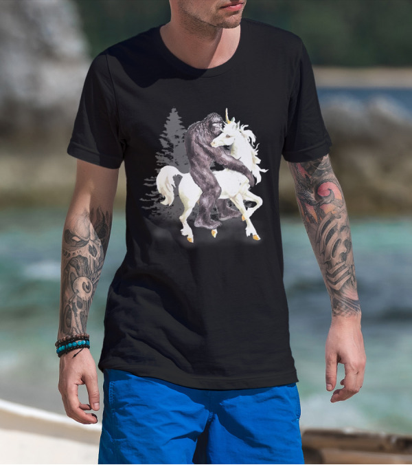 Bigfoot Sasquatch On A Unicorn In Mystical Forest Scene T-Shirt