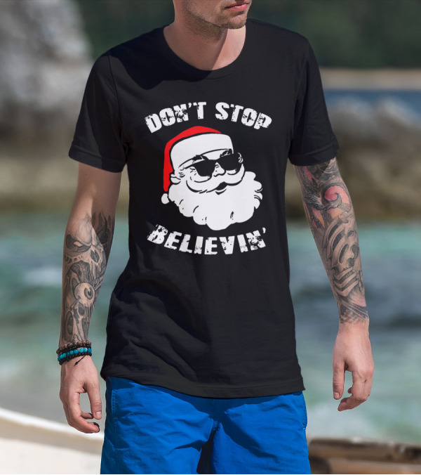 DON'T STOP BELIEVIN' SANTA WITH SUNGLASSES T-Shirt