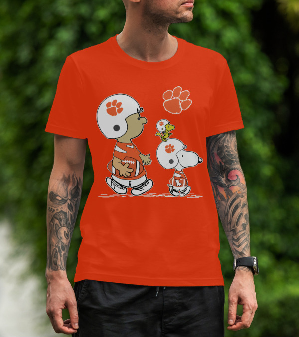 Clemson Tigers Snoopy Football Helmets And Paw Print Charlie Brown Woodstock T-Shirt