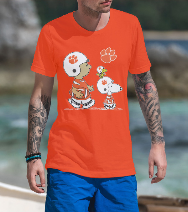 Clemson Tigers Snoopy Football Helmets And Paw Print Charlie Brown Woodstock T-Shirt
