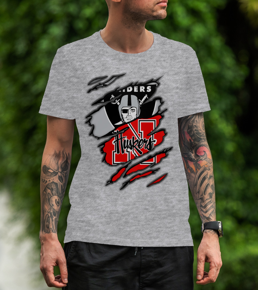 Raiders Huskers Torn Design With Icons And Symbols T-Shirt