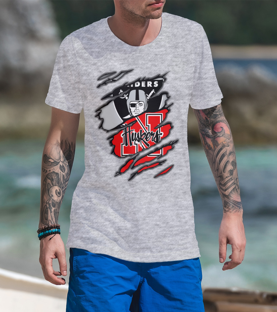 Raiders Huskers Torn Design With Icons And Symbols T-Shirt