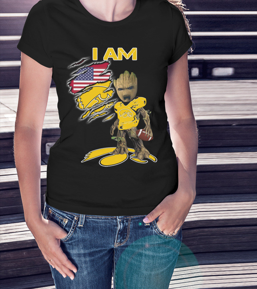 I Am Hawkeyes Baby Groot Holding Football With Usa Flag And Iowa Hawkeyes T-Shirt