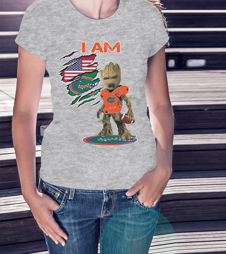 I Am Gators Baby Groot Holding Football With American Flag And Florida Gators T-Shirt