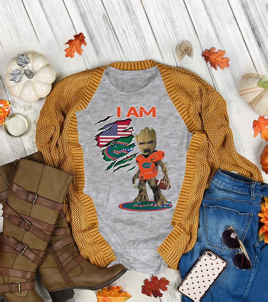 I Am Gators Baby Groot Holding Football With American Flag And Florida Gators T-Shirt