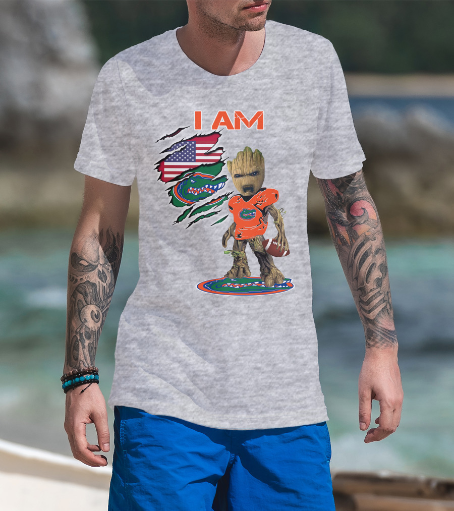 I Am Gators Baby Groot Holding Football With American Flag And Florida Gators T-Shirt