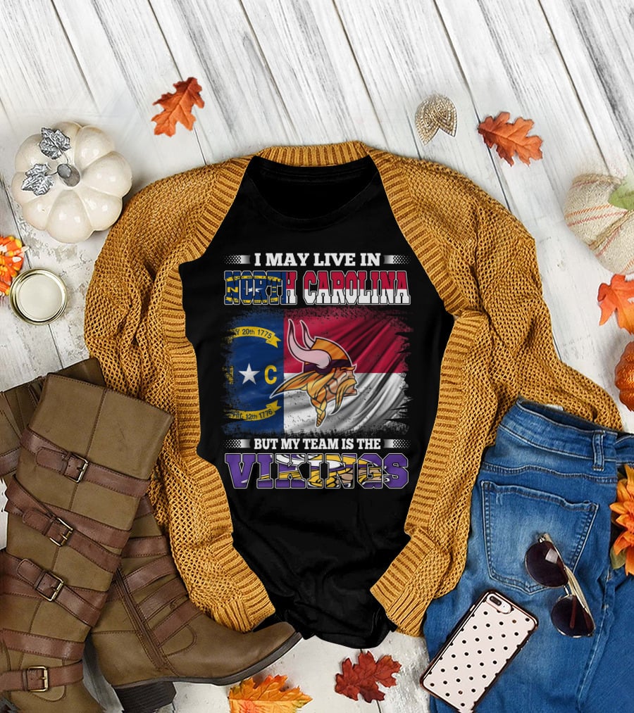 I May Live In North Carolina North Carolina Flag But My Team Is The Vikings Football Vikings T-Shirt
