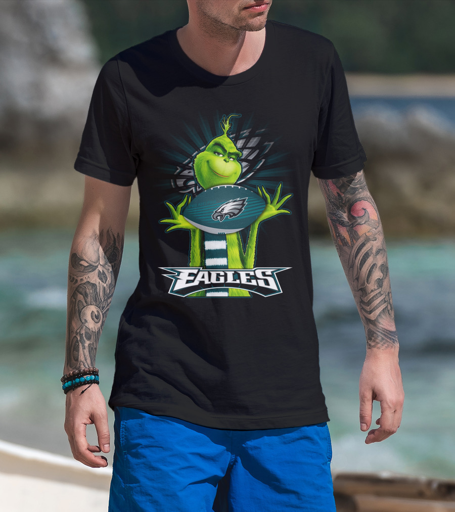 Grinch Holding Philadelphia Eagles Football With Team T-Shirt