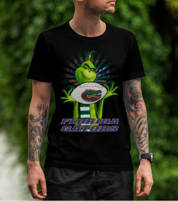 Grinch Holding Florida Gators Football T-Shirt
