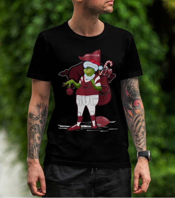 Grinchxmas Arkansas Razorbacks Santa Hat Football Candy Cane T-Shirt