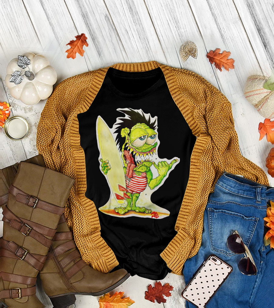 Surfer Punk Willy Monster with Spiked Hair and Striped Shirt Eating Meat Stick Holding Surfboard and Making Shaka Sign T-Shirt