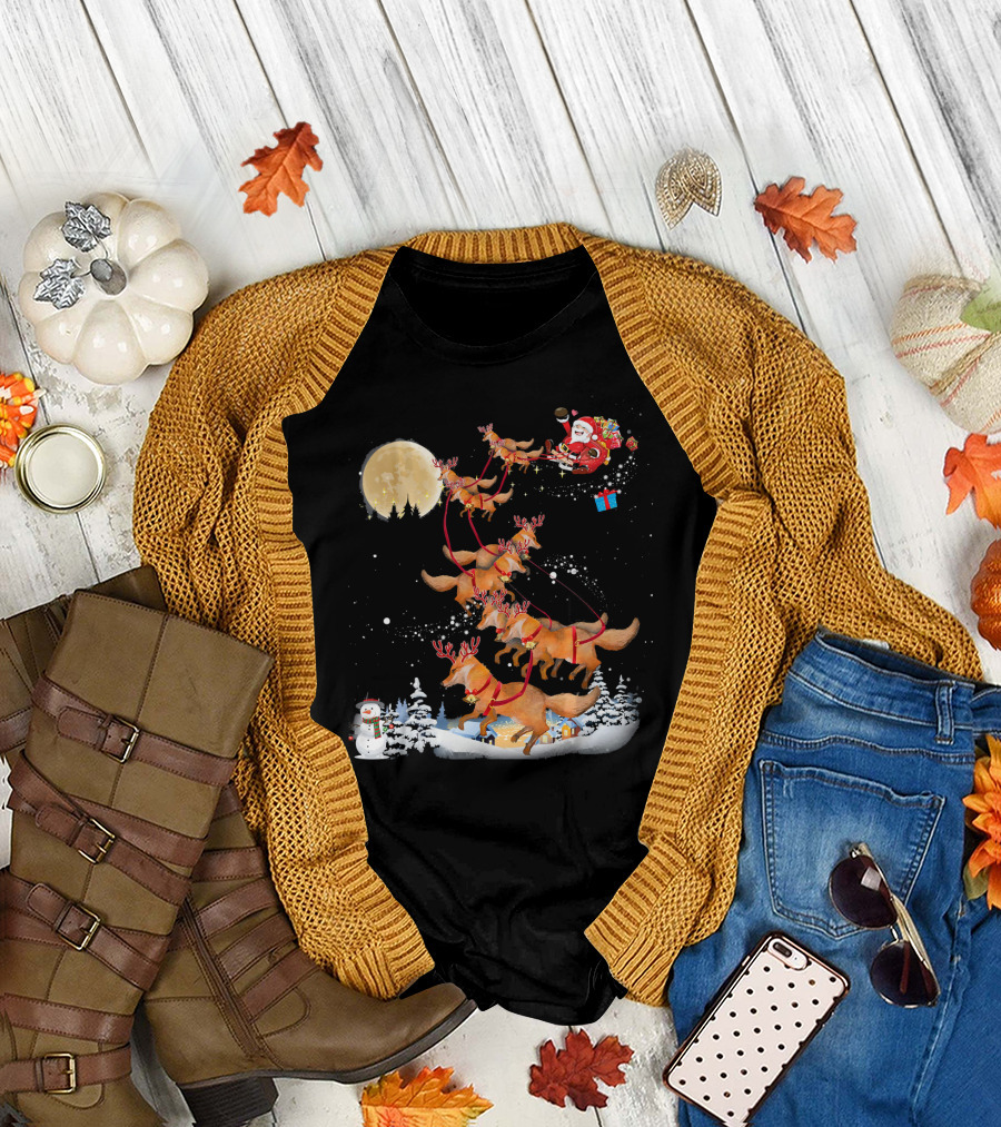 Santa Riding Foxes with Reindeer Antlers in Snowy Moonlit Scene T-Shirt