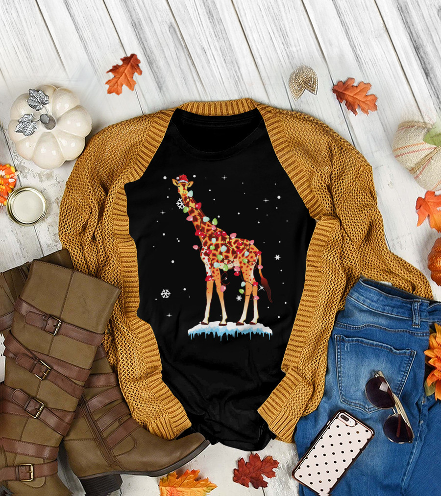Colorful Festive Giraffe Wrapped in Christmas Lights in Snowfall Scene T-Shirt