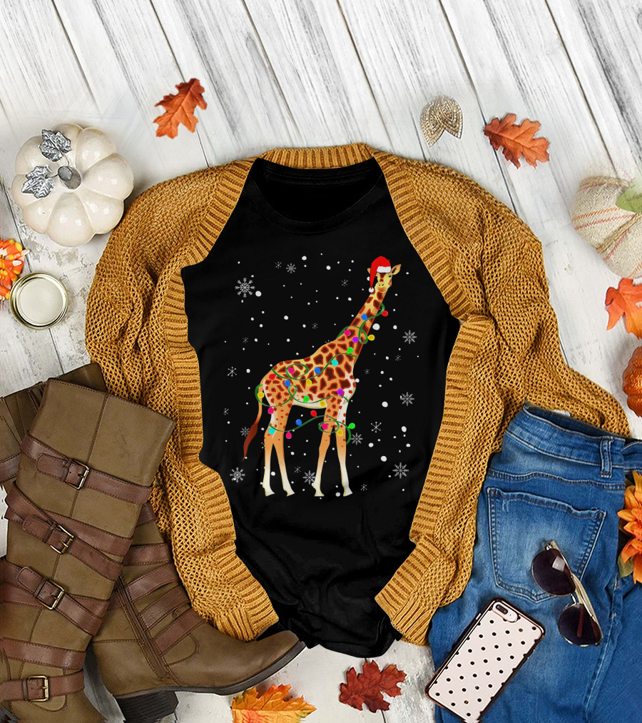Giraffe Wrapped in Christmas Lights Wearing Santa Hat with Snowflakes T-Shirt