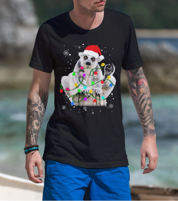 Lemur With Santa Hat And Colorful Christmas Lights Surrounded By Snowflakes T-Shirt