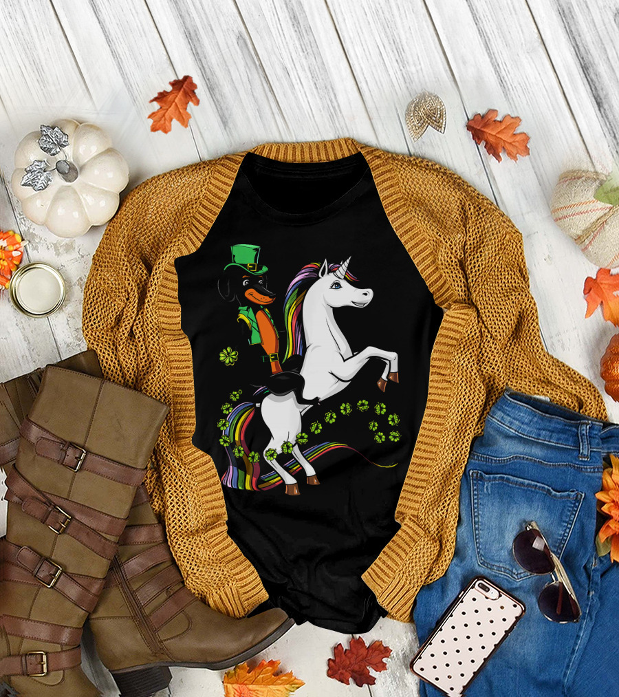 Dachshund Wiener Dog in Leprechaun Outfit Riding Rainbow Unicorn with Shamrocks T-Shirt