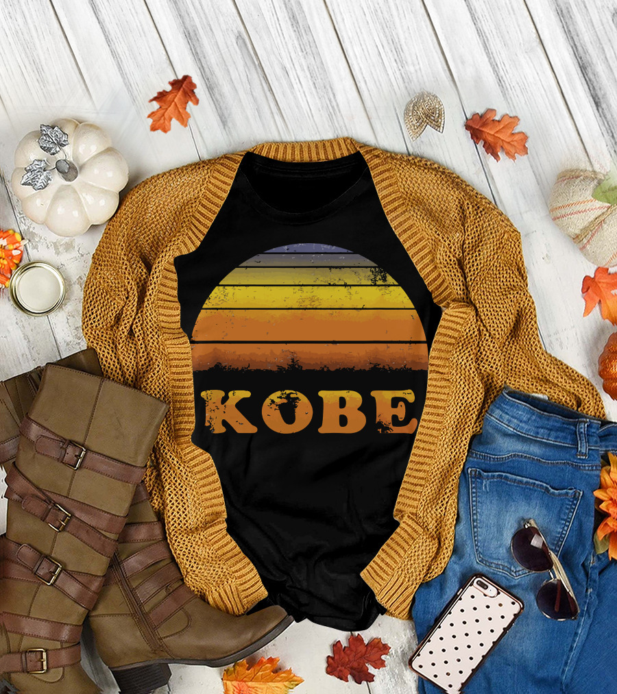 Fall flat lay featuring Kobe Retro Sunset T-Shirt with cardigan.
