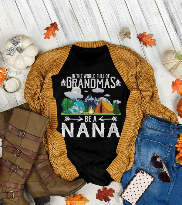 In The World Full Of Grandmas Be A Nana Funny Camping Mountains Campfire Tent Camper Clouds T-Shirt