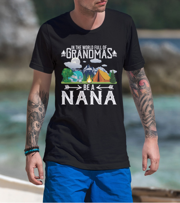 In The World Full Of Grandmas Be A Nana Funny Camping Mountains Campfire Tent Camper Clouds T-Shirt