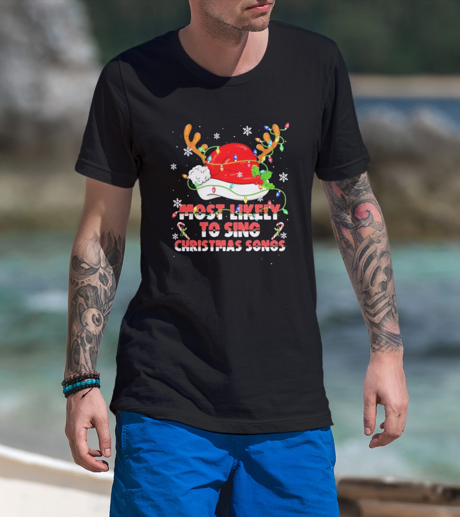 Most Likely To Sing Christmas Songs Santa Hat Reindeer Antlers Lights T-Shirt