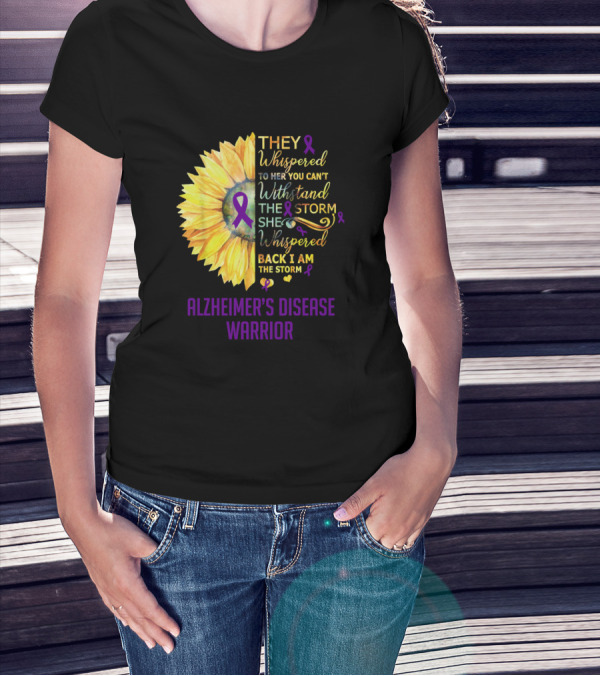THEY WHISPERED TO HER YOU CAN'T WITHSTAND THE STORM SHE WHISPERED BACK I AM THE STORM ALZHEIMER'S DISEASE WARRIOR T-Shirt