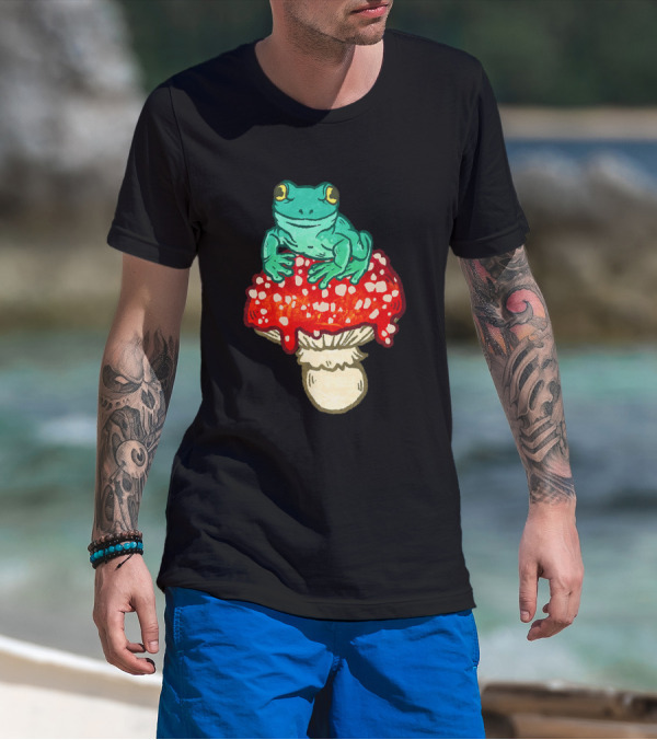 Cute Frog Perched Atop Vibrant Red And White Spotted Mushroom T-Shirt