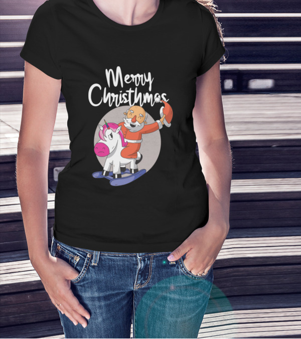 Woman with hands in pockets wearing Merry Christmas Santa Riding Unicorn T-Shirt.