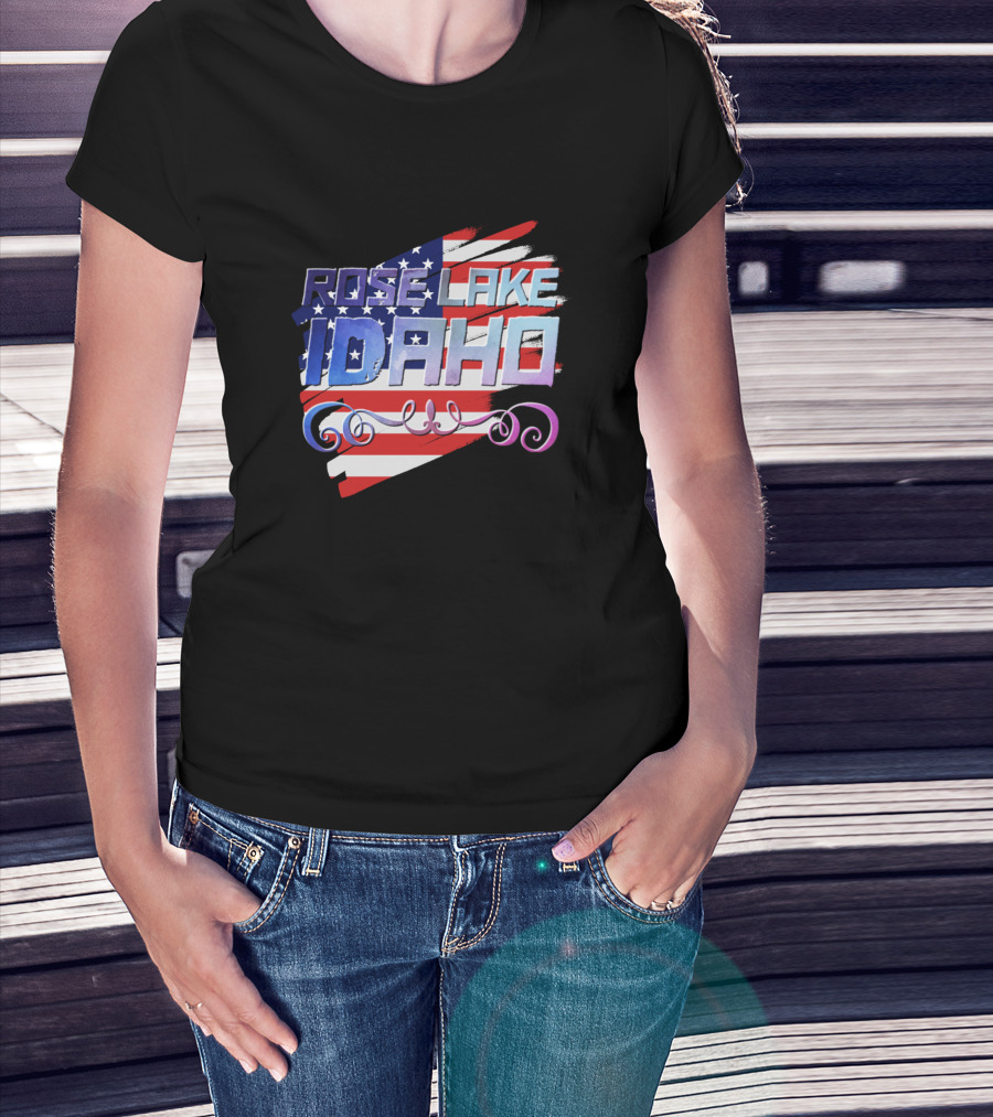 Woman with hands in pockets wearing Rose Lake Idaho American Flag T-Shirt.