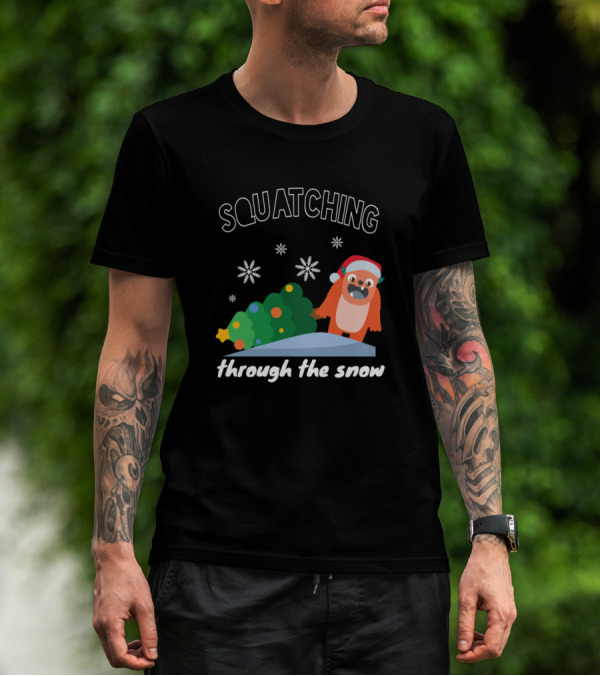 Squatching Through The Snow Christmas Sasquatch Holiday Santa Hat Snowflakes T-Shirt