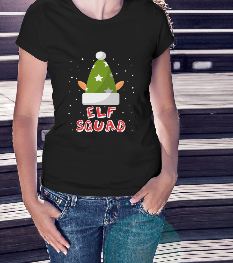 Woman with hands in pockets wearing Elf Squad Festive Green Hat with Stars and Ears T-Shirt.