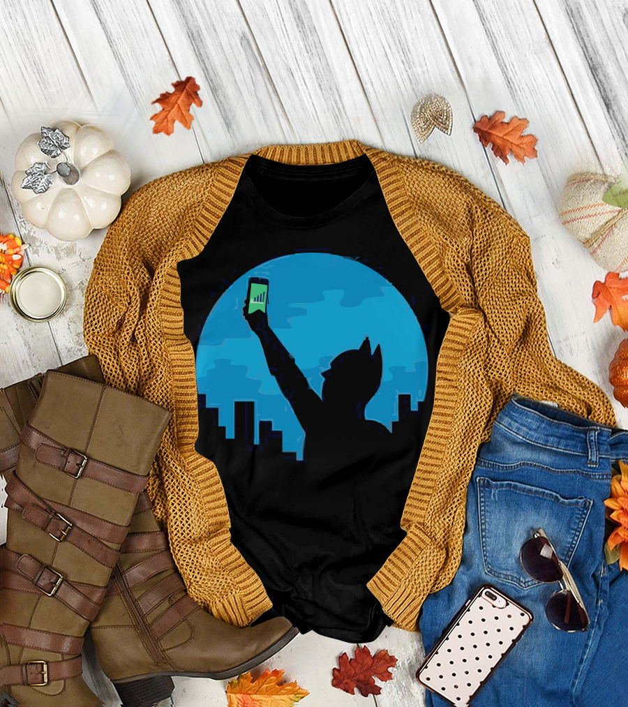 Bat Signal Silhouette Holding Smartphone Against City Skyline T-Shirt