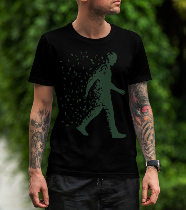 Blown Away Leaves Silhouette Walking Figure T-Shirt
