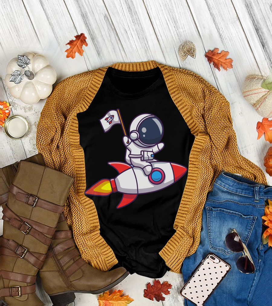 Astronaut Holding Flag Riding Rocket with Red and White T-Shirt
