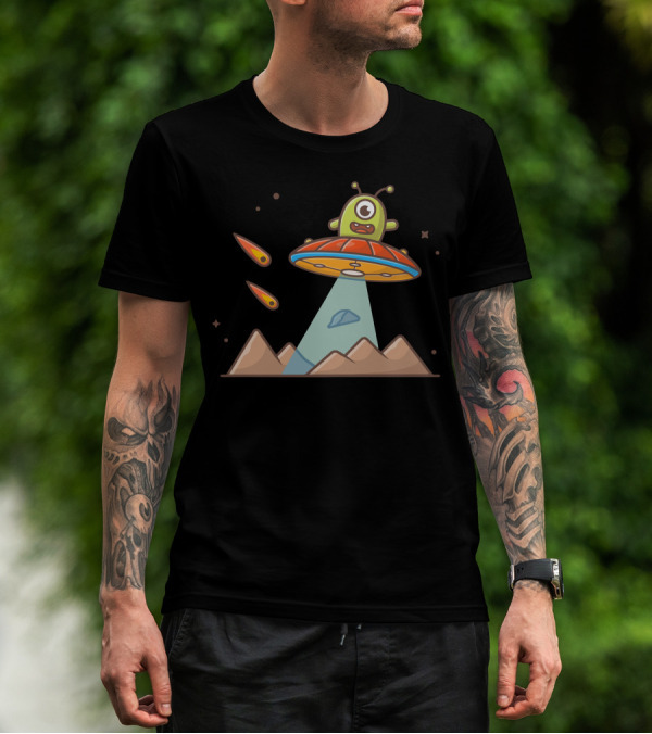 Cute Alien In UFO Hovering Over Mountains With Meteorites T-Shirt