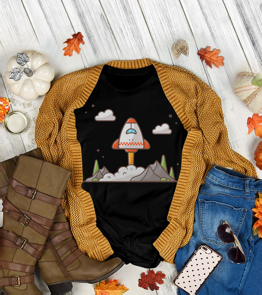 Space Shuttle Launch Amidst Clouds Over Mountain and Tree Landscape T-Shirt